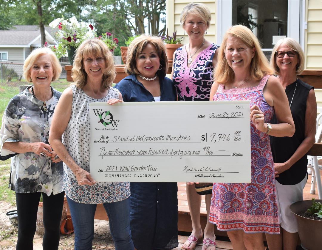 Women of Woodside present check to charity