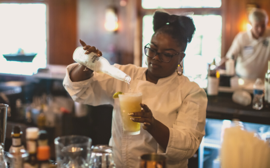 Woman pouring beer