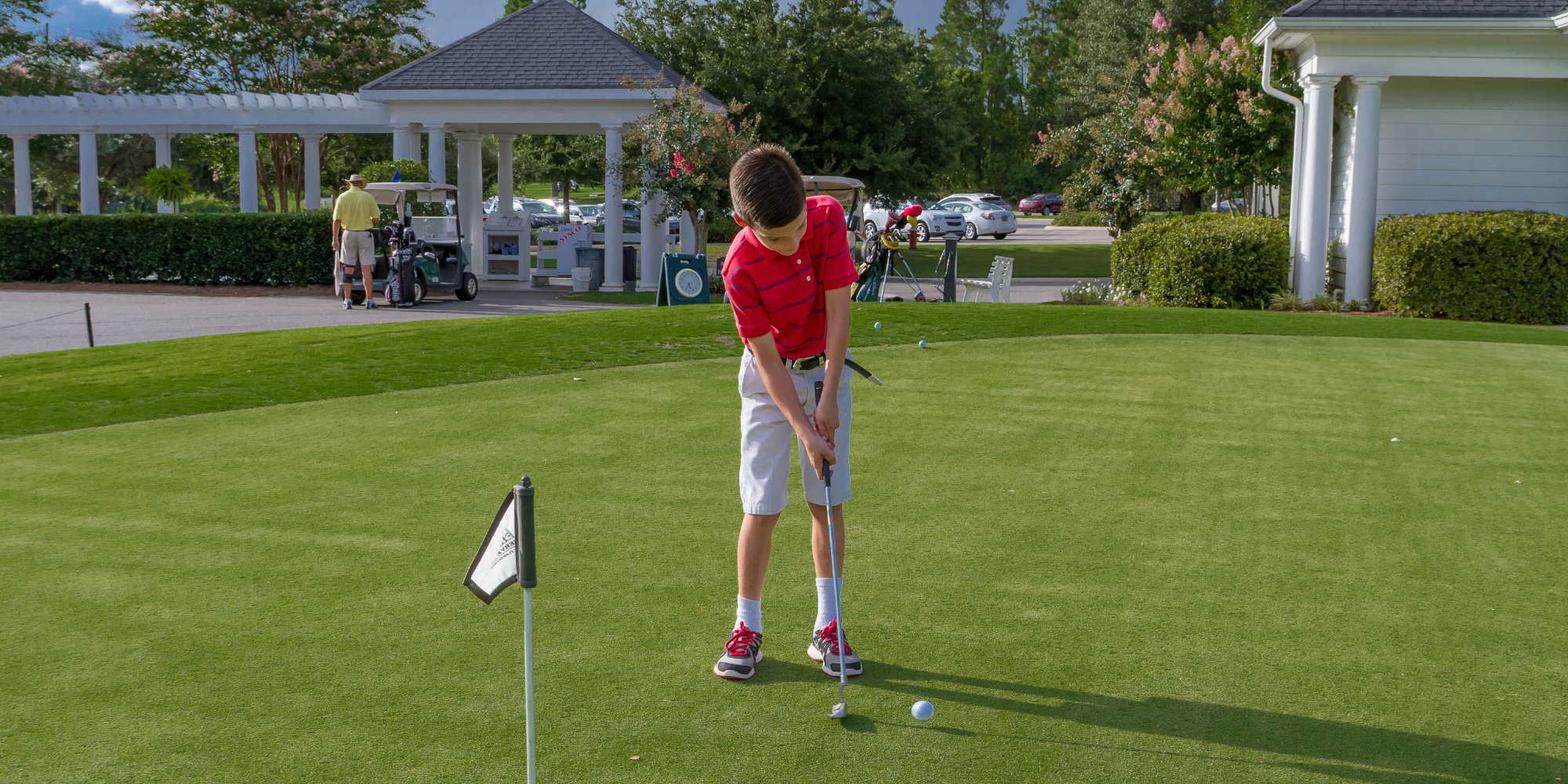 Kid playing golf